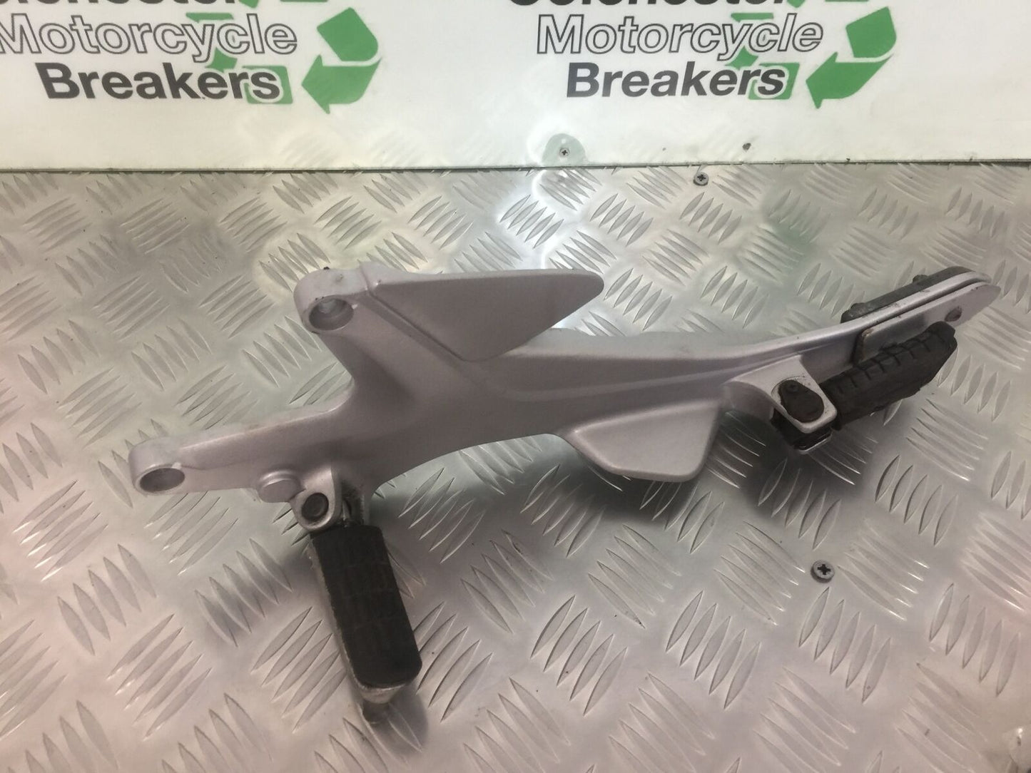 HONDA CBF500 CBF 500 LEFT HANGER AND PEGS  YEAR 2004-08 (STOCK 917)