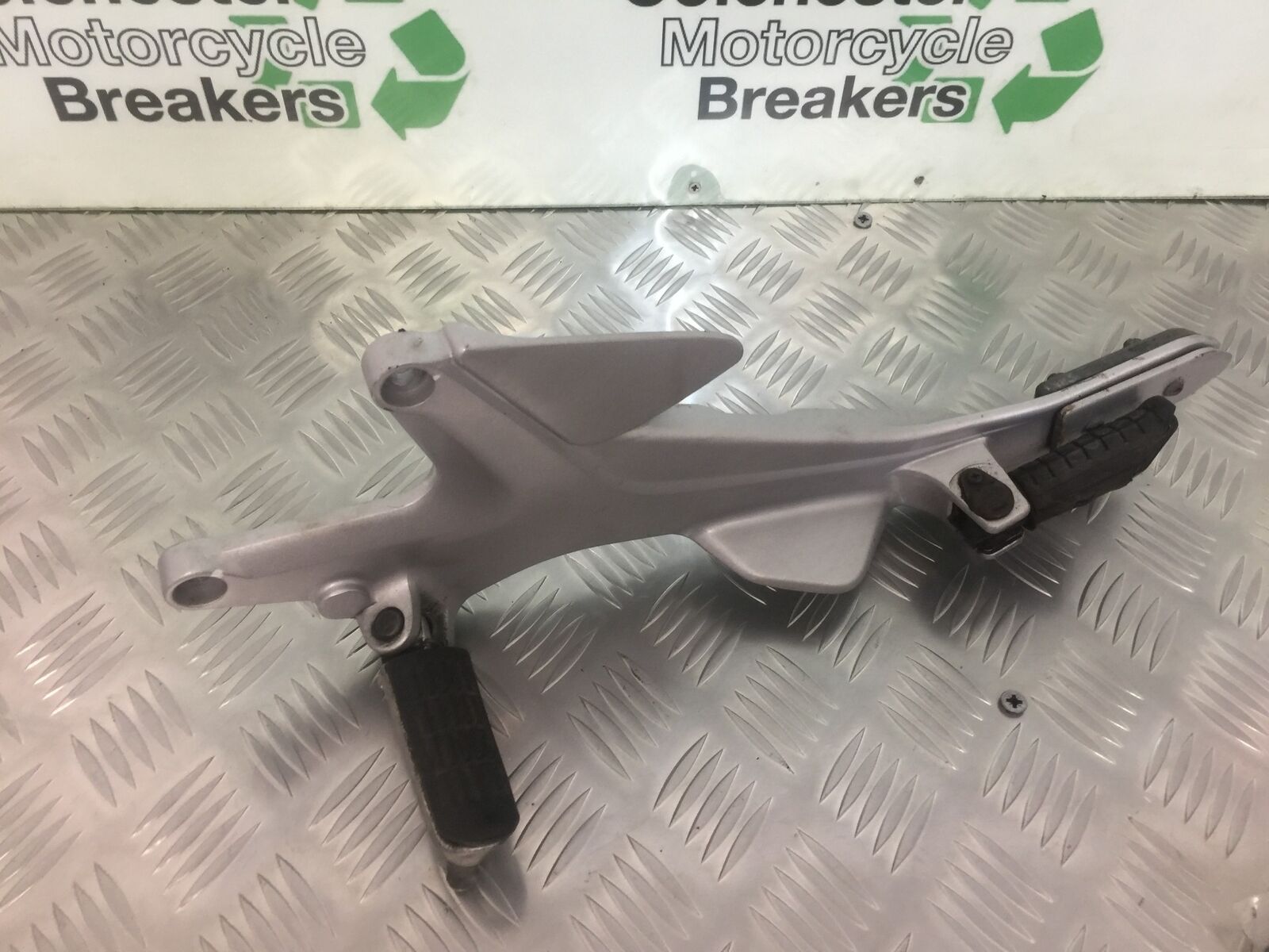 HONDA CBF500 CBF 500 LEFT HANGER AND PEGS  YEAR 2004-08 (STOCK 917)