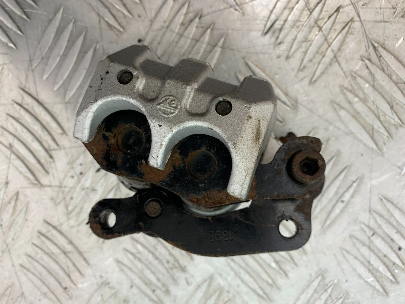 QINGQI QM125 GY-2B FRONT BRAKE CALIPER YEAR 2016 (CMB1228)