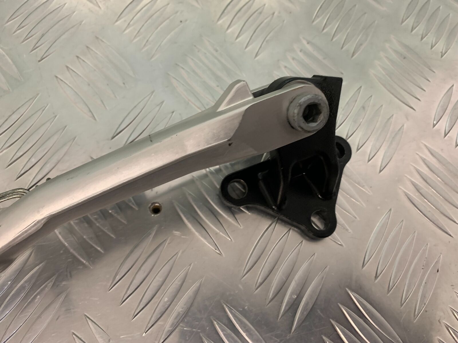 TRIUMPH SPEED TRIPLE R 1050 SIDE STAND AND BRACKET   YEAR 2014 (STOCK 934)