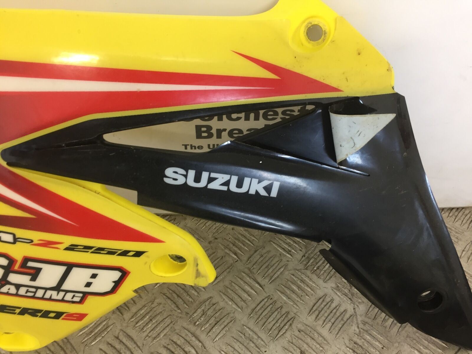 SUZUKI RMZ250 RMZ 250 LEFT RADIATOR COWL    YEAR 2010