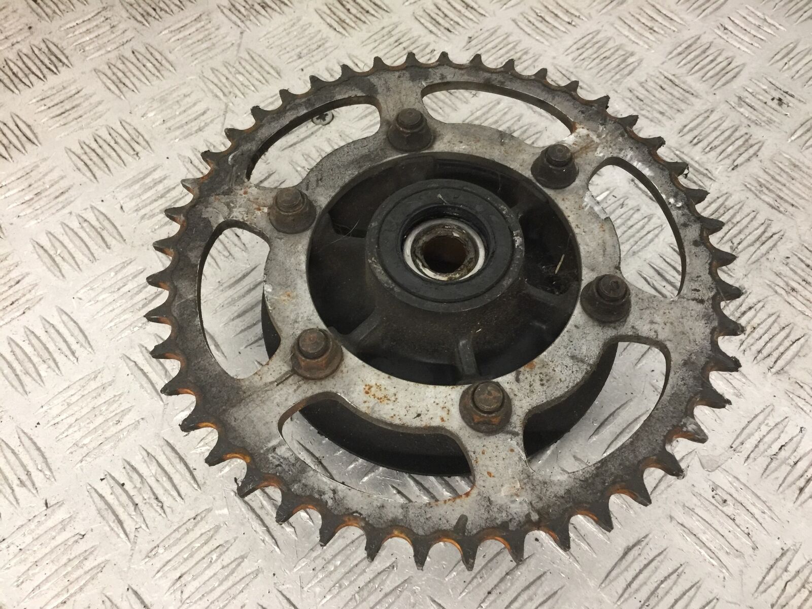 KAWASAKI NINJA 250 R EX250 REAR SPROCKET CARRIER YEAR 2008  (STOCK 879)