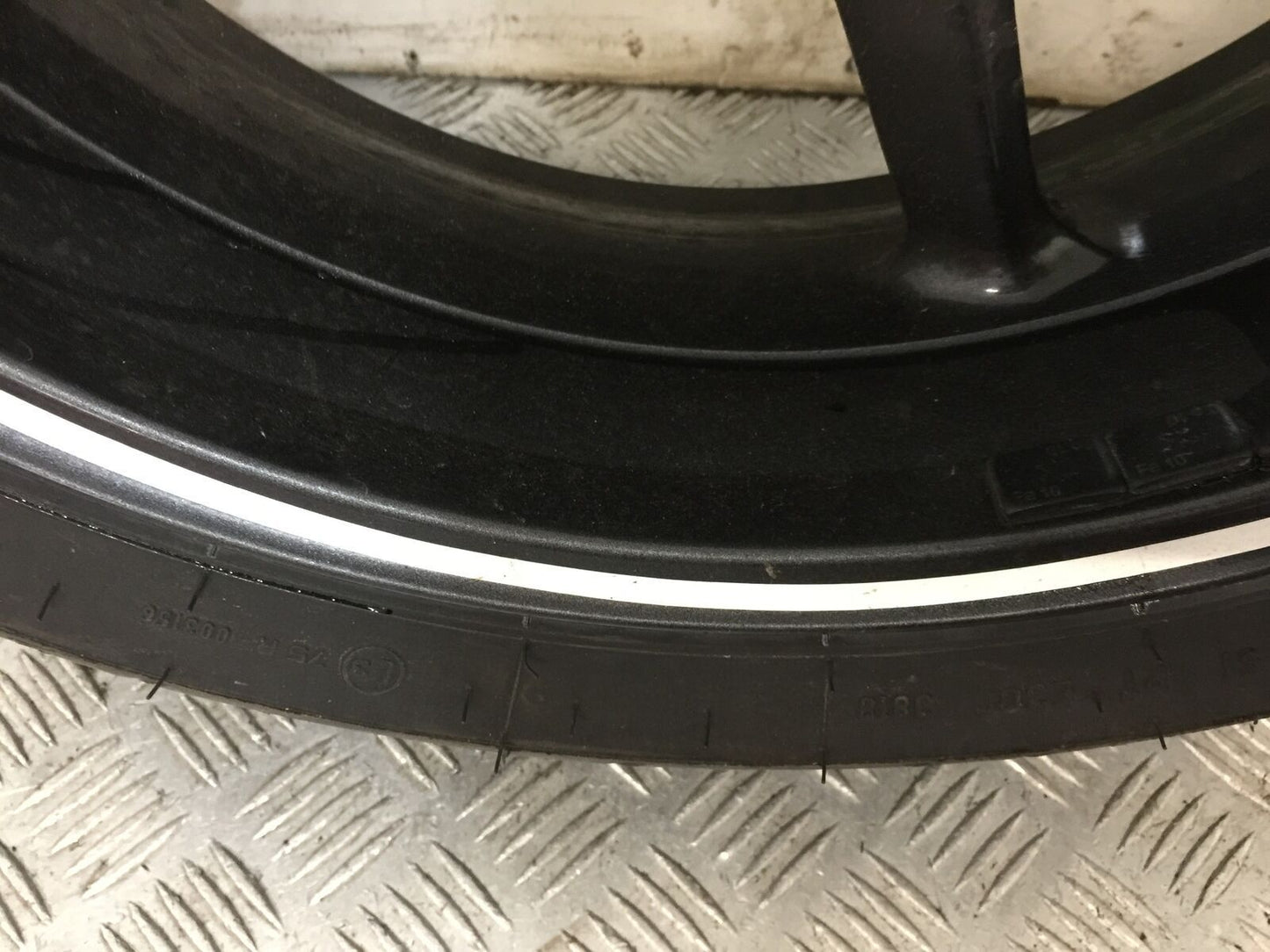 TRIUMPH 675 STREET TRIPLE R REAR WHEEL  YEAR 2012 (STOCK 849)