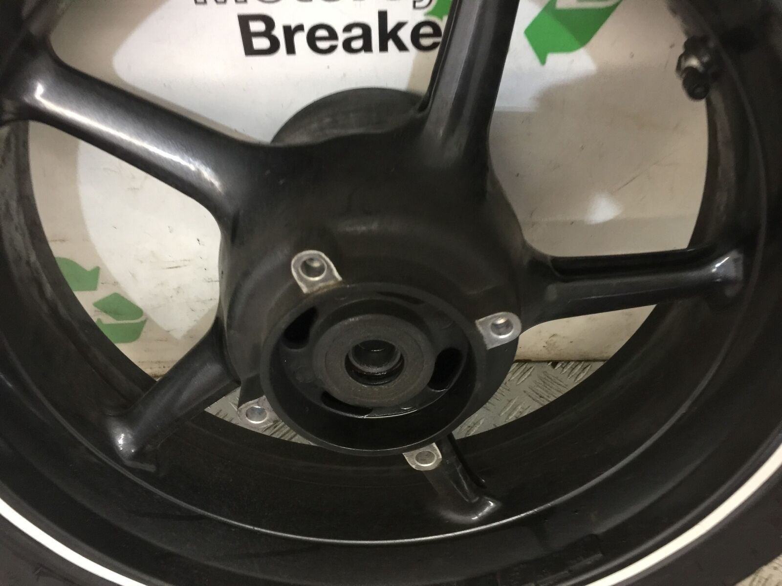 TRIUMPH 675 STREET TRIPLE R REAR WHEEL  YEAR 2012 (STOCK 849)