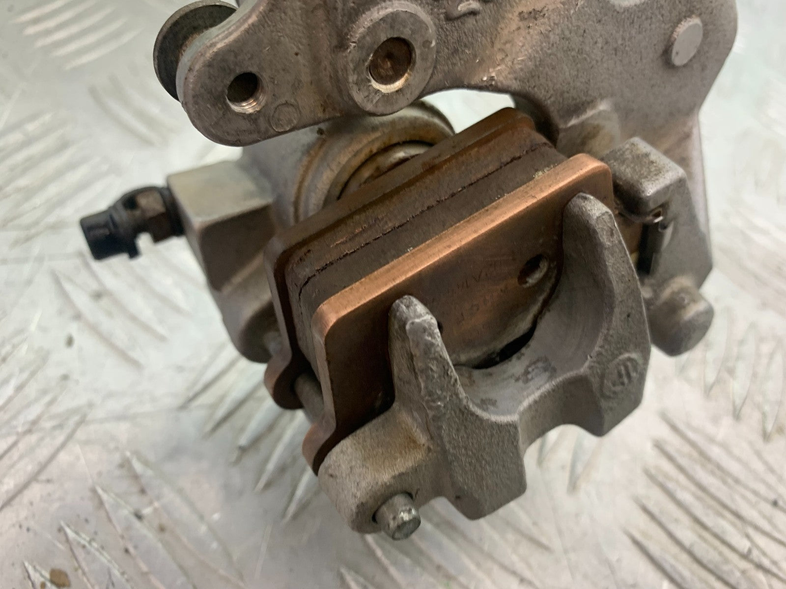 KAWASAKI KXF450 KXF 450 REAR BRAKE CALIPER AND BRACKET  YEAR 2013 CMB1217)