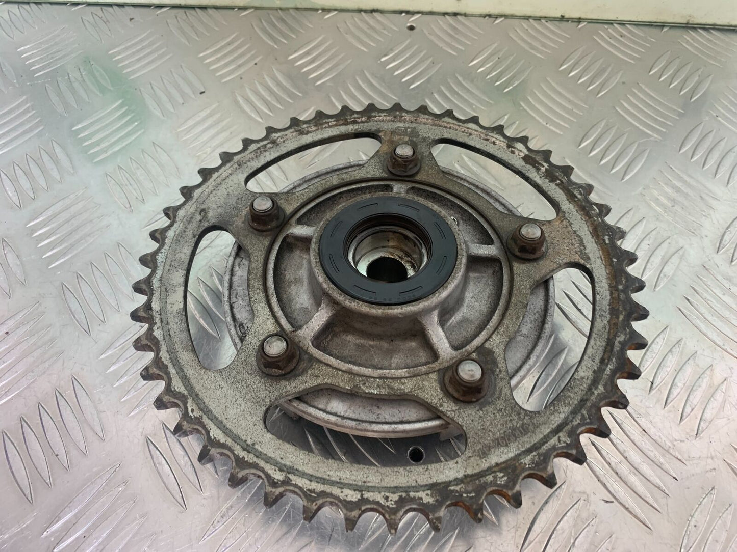 SUZUKI DL 650 V-STROM REAR SPROCKET CARRIER YEAR 2016 (STOCK 996)