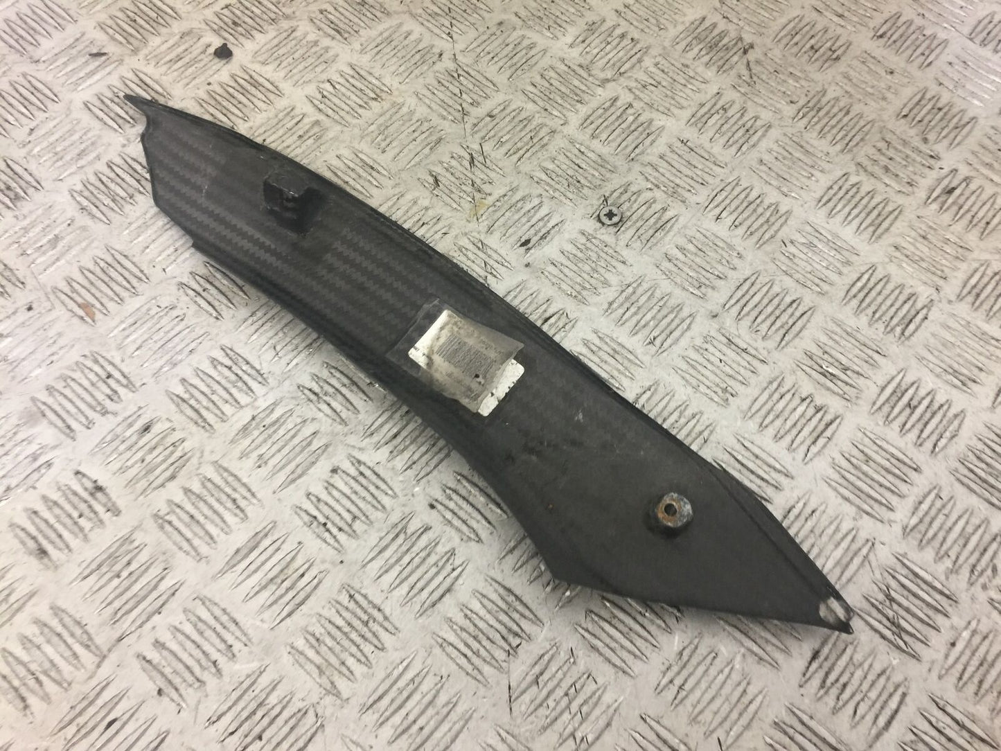 TRIUMPH 675 DAYTONA CARBON LEFT TOP INFILL  YEAR 2008-2011 (STOCK 640)