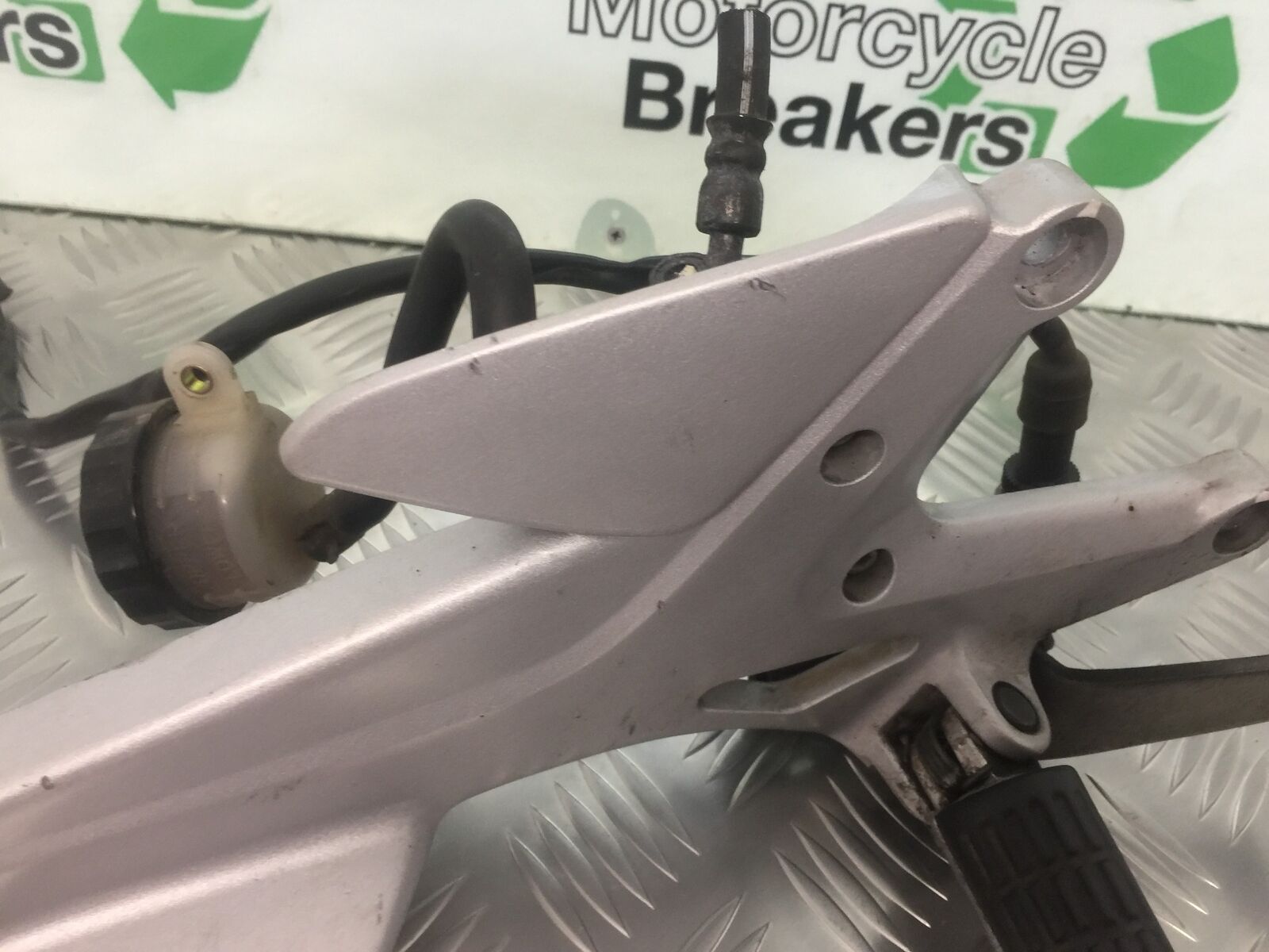 HONDA CBF500 CBF 500 RIGHT HANGER AND PEGS  YEAR 2004-08 (STOCK 917)