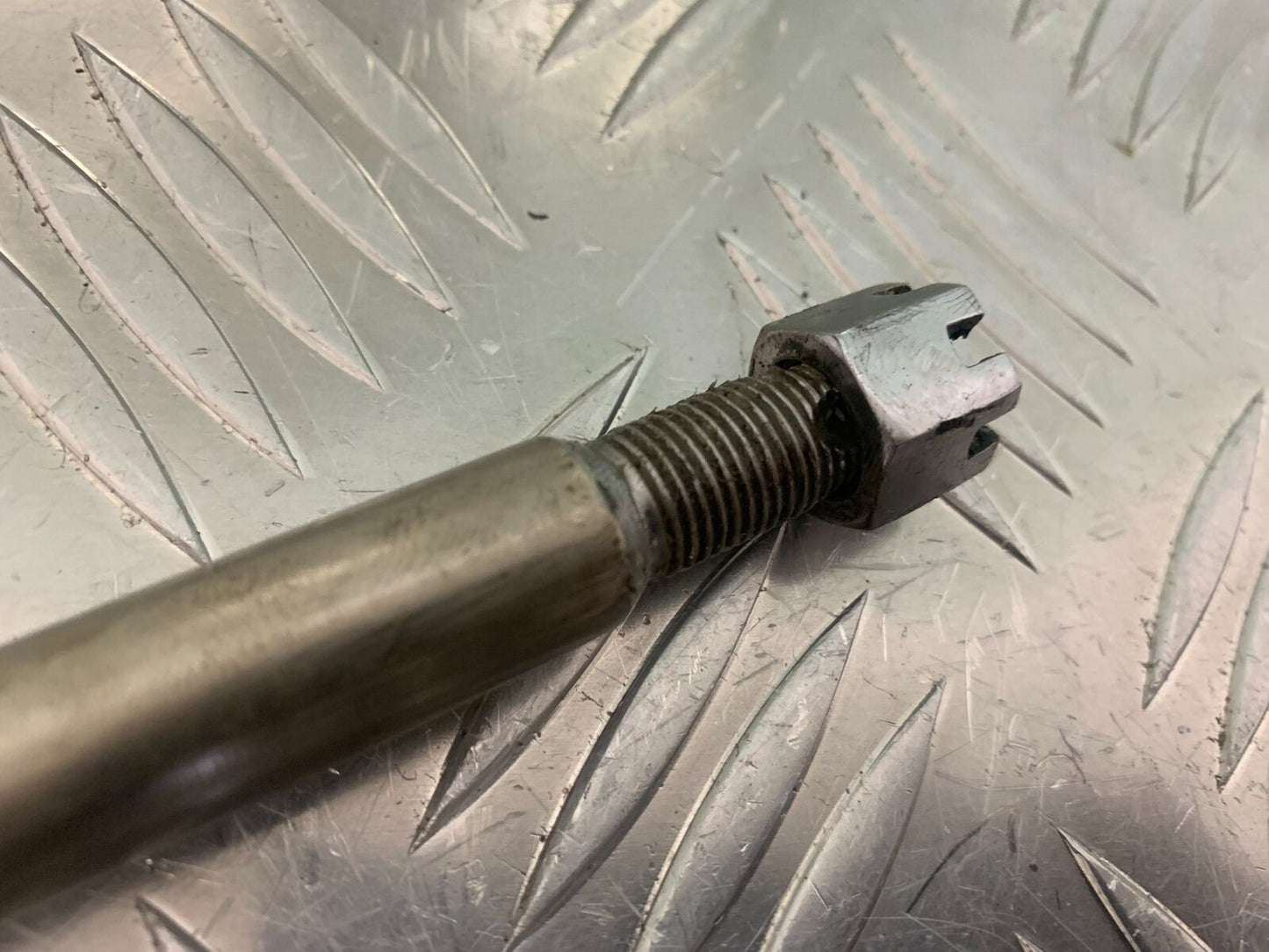 SUZUKI GS750 E GS 750E FRONT WHEEL SPINDLE  YEAR 1979  (STOCK 959)