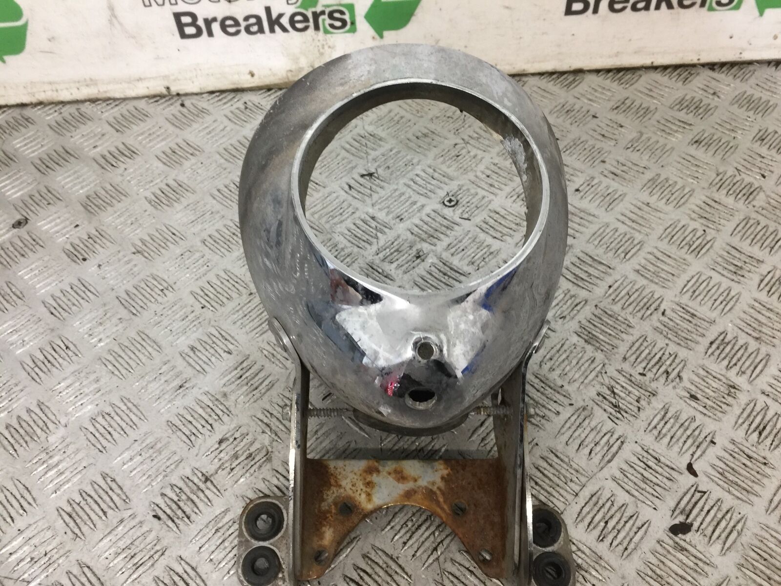 VICTORY V92 C HEADLIGHT BACKING  YEAR 2004 (STOCK 765)