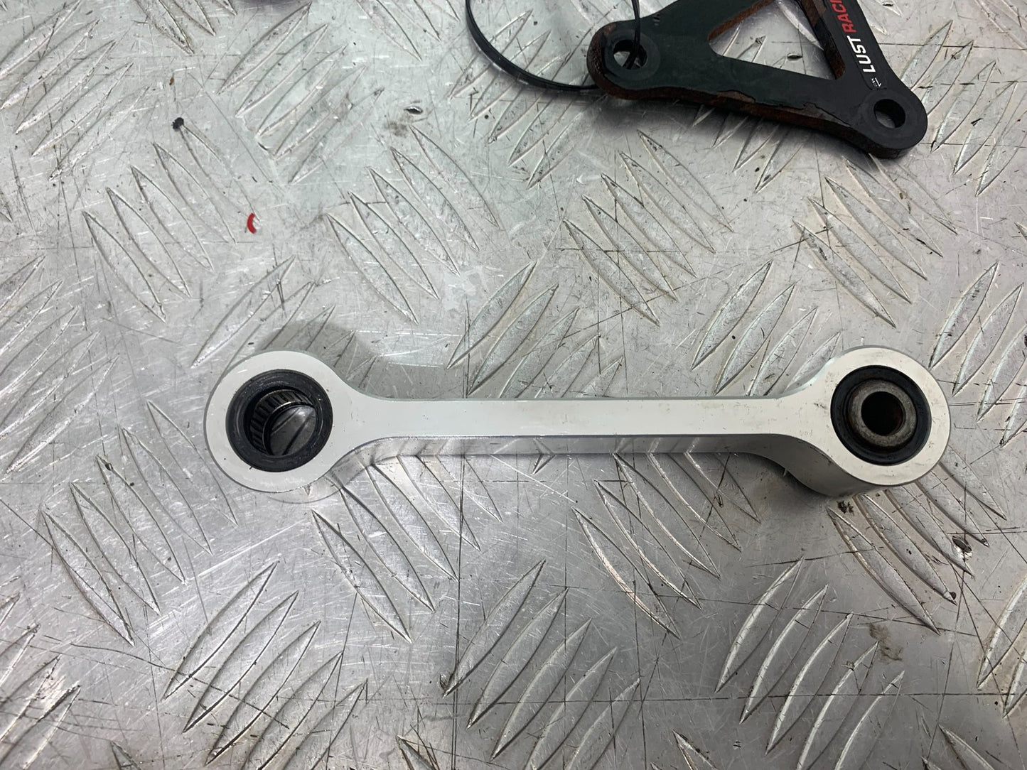 TRIUMPH 675 STREET TRIPLE R REAR SHOCK LINKAGE  YEAR 2013 - 2016 (CMB1221)