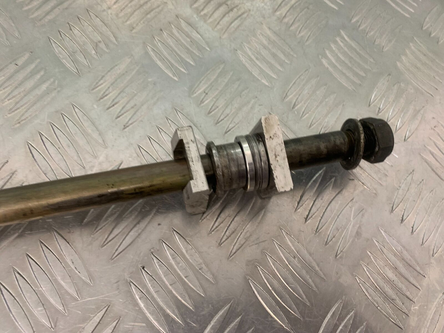 TRIUMPH 955I SPRINT RS REAR WHEEL SPINDLE YEAR 1999-04 (STOCK 989)