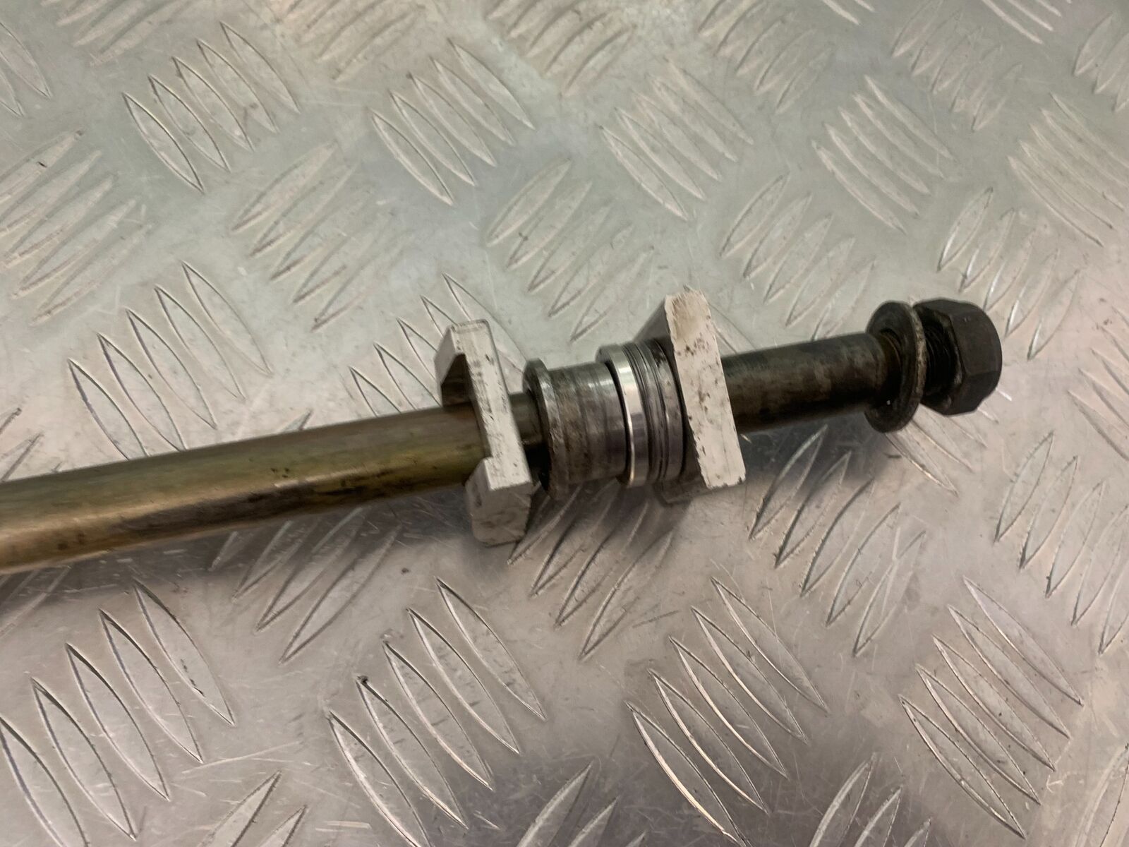 TRIUMPH 955I SPRINT RS REAR WHEEL SPINDLE YEAR 1999-04 (STOCK 989)