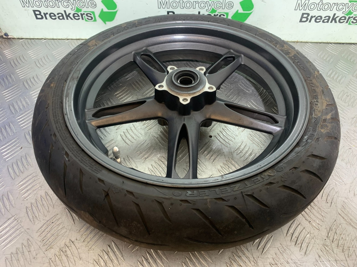 TRIUMPH 1050 SPEED TRIPLE FRONT WHEEL   YEAR 2005-2007 (CMB1322)