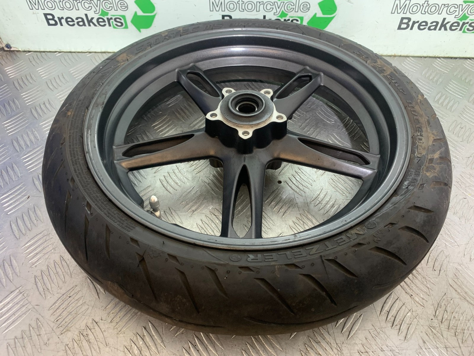 TRIUMPH 1050 SPEED TRIPLE FRONT WHEEL   YEAR 2005-2007 (CMB1322)