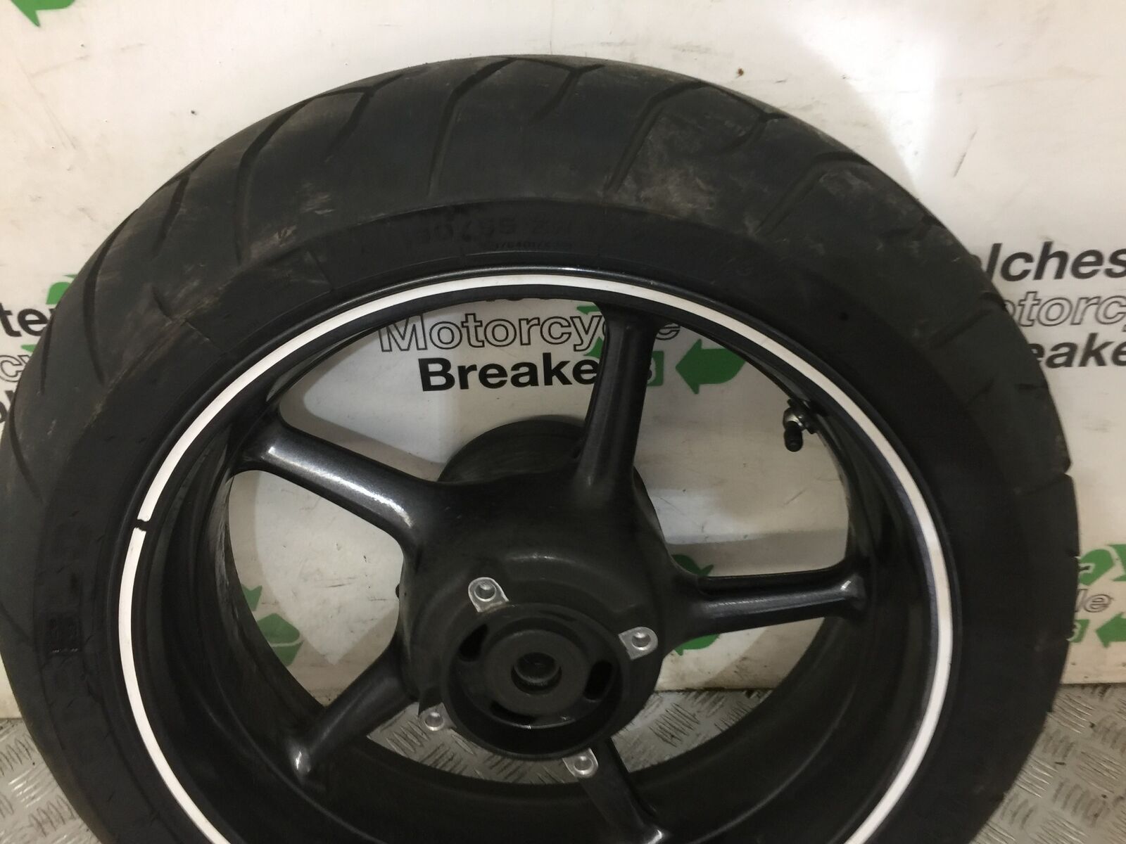 TRIUMPH 675 STREET TRIPLE R REAR WHEEL  YEAR 2012 (STOCK 849)