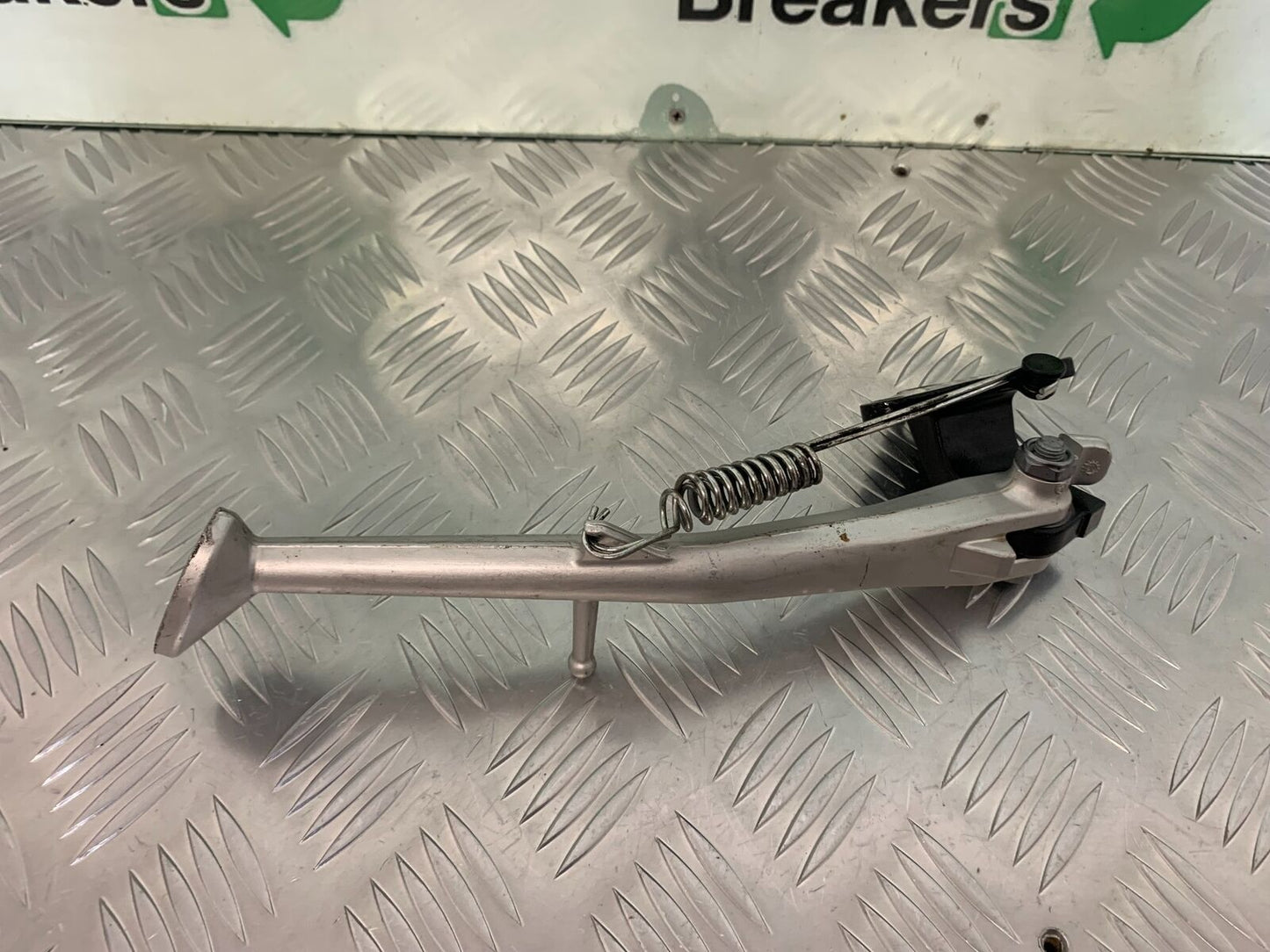 TRIUMPH SPEED TRIPLE R 1050 SIDE STAND AND BRACKET   YEAR 2014 (STOCK 934)