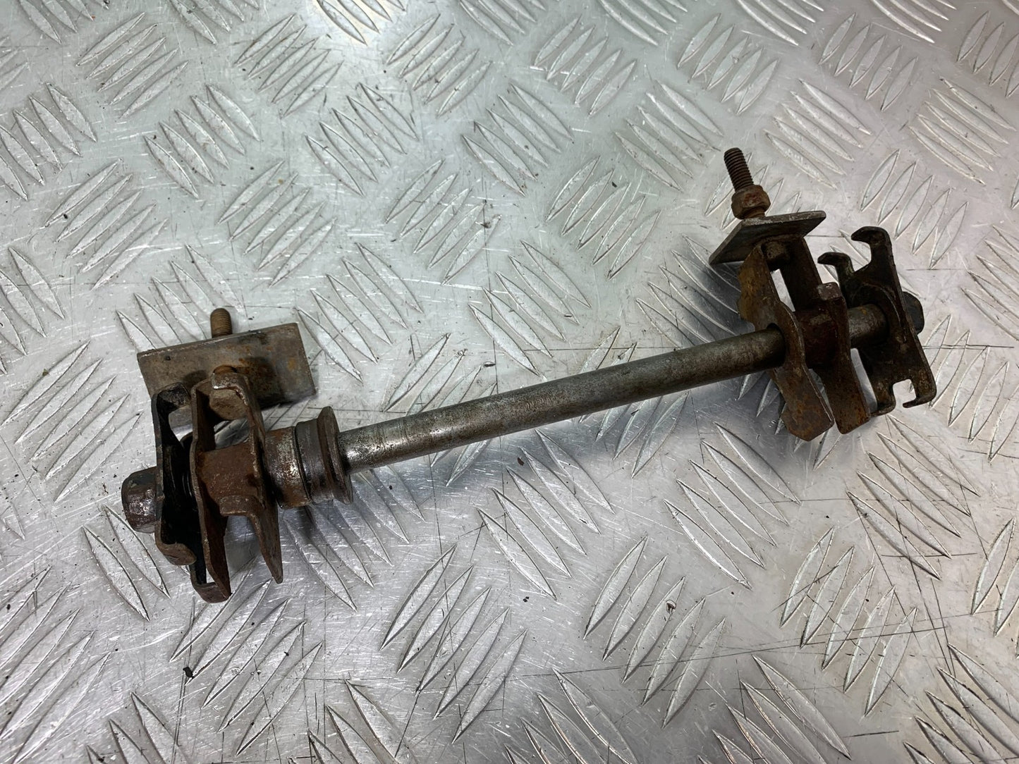 QINGQI QM125 GY-2B REAR WHEEL SPINDLE   YEAR 2016 (CMB1228)