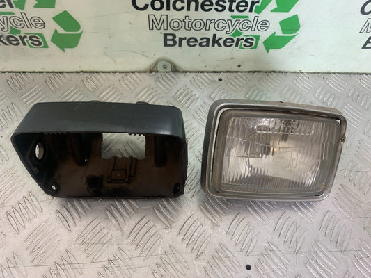 KAWASAKI GT550 GT 550 HEADLIGHT AND BACKING  YEAR 1989-1994
