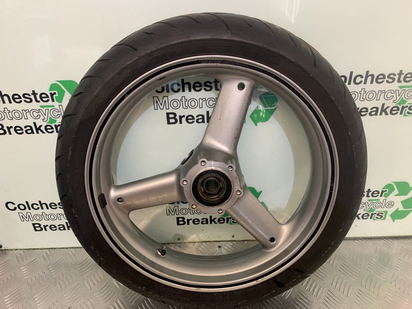 TRIUMPH 955I SPRINT RS FRONT WHEEL  YEAR 1999-04 (STOCK 989)