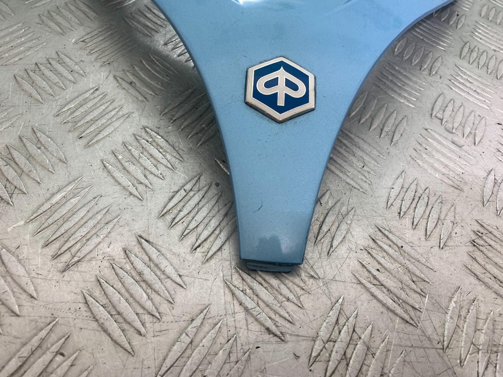 PIAGGIO MP3 250 ie HEADLIGHT SURROUND  YEAR 2007 (CMB1307)