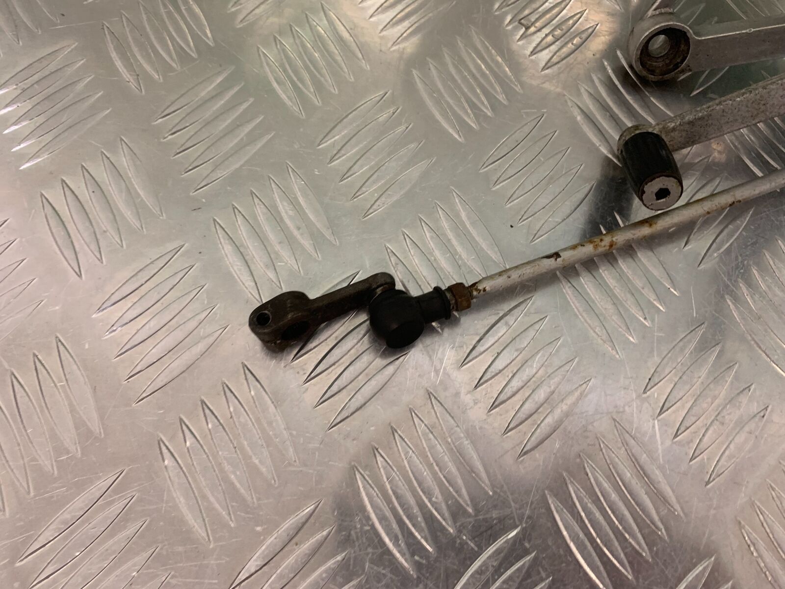 HONDA CBR 400 NC23 TRI-ARM FRONT LEFT HANGER  YEAR 1987-89 (STOCK 969)