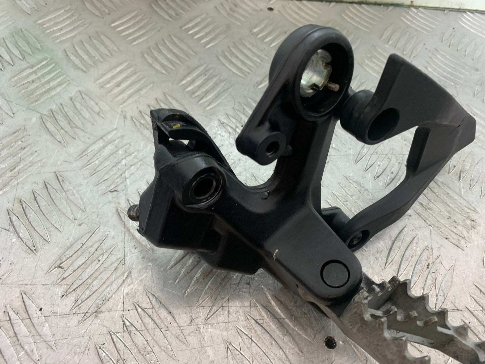 KTM 390 ADVENTURE FRONT LEFT HANGER AND PEG   YEAR 2020-24 (CMB1240)