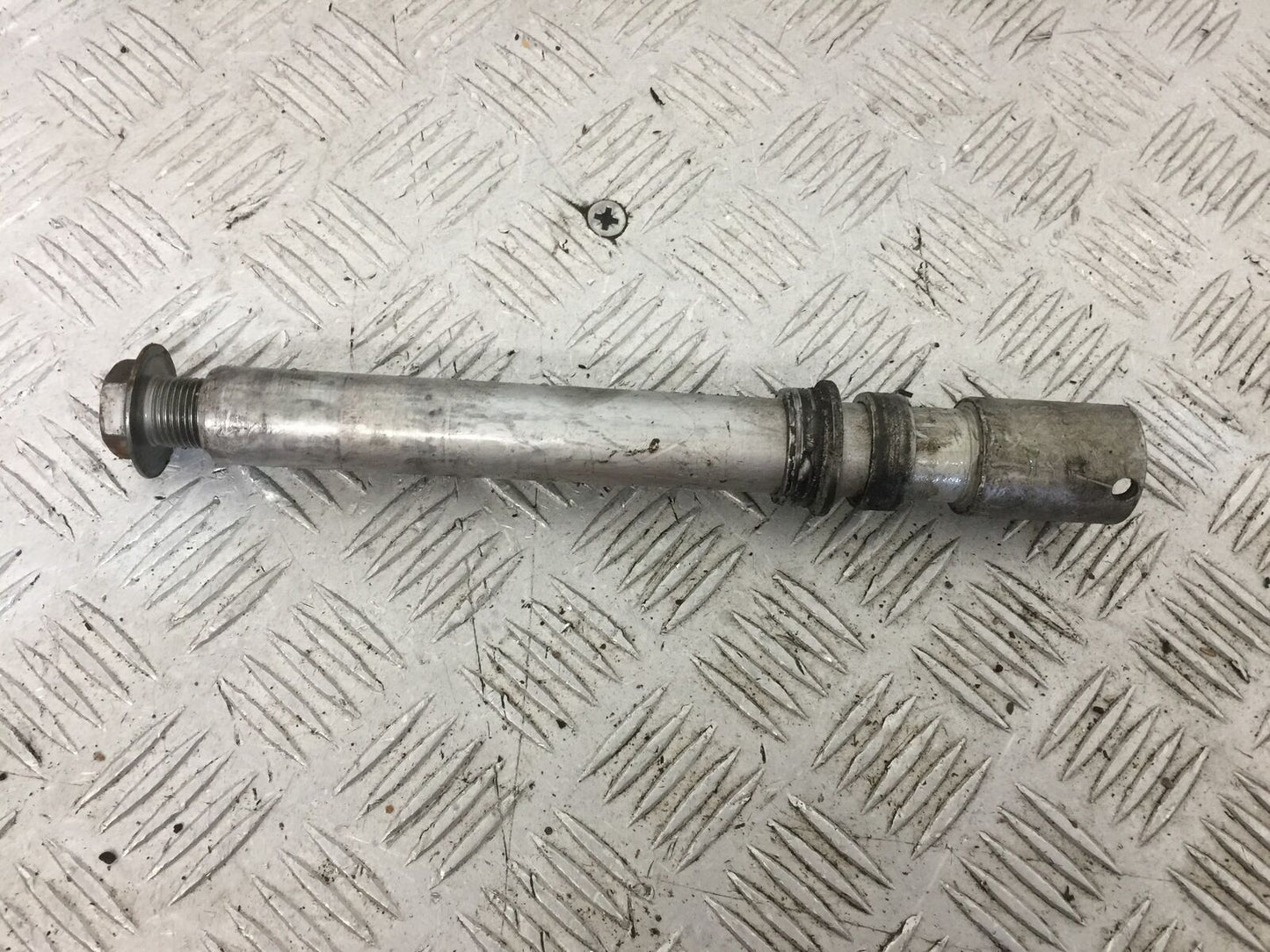 HONDA CBR1000 rr FIREBLADE FRONT WHEEL SPINDLE   YEAR 2004  (STOCK 853)