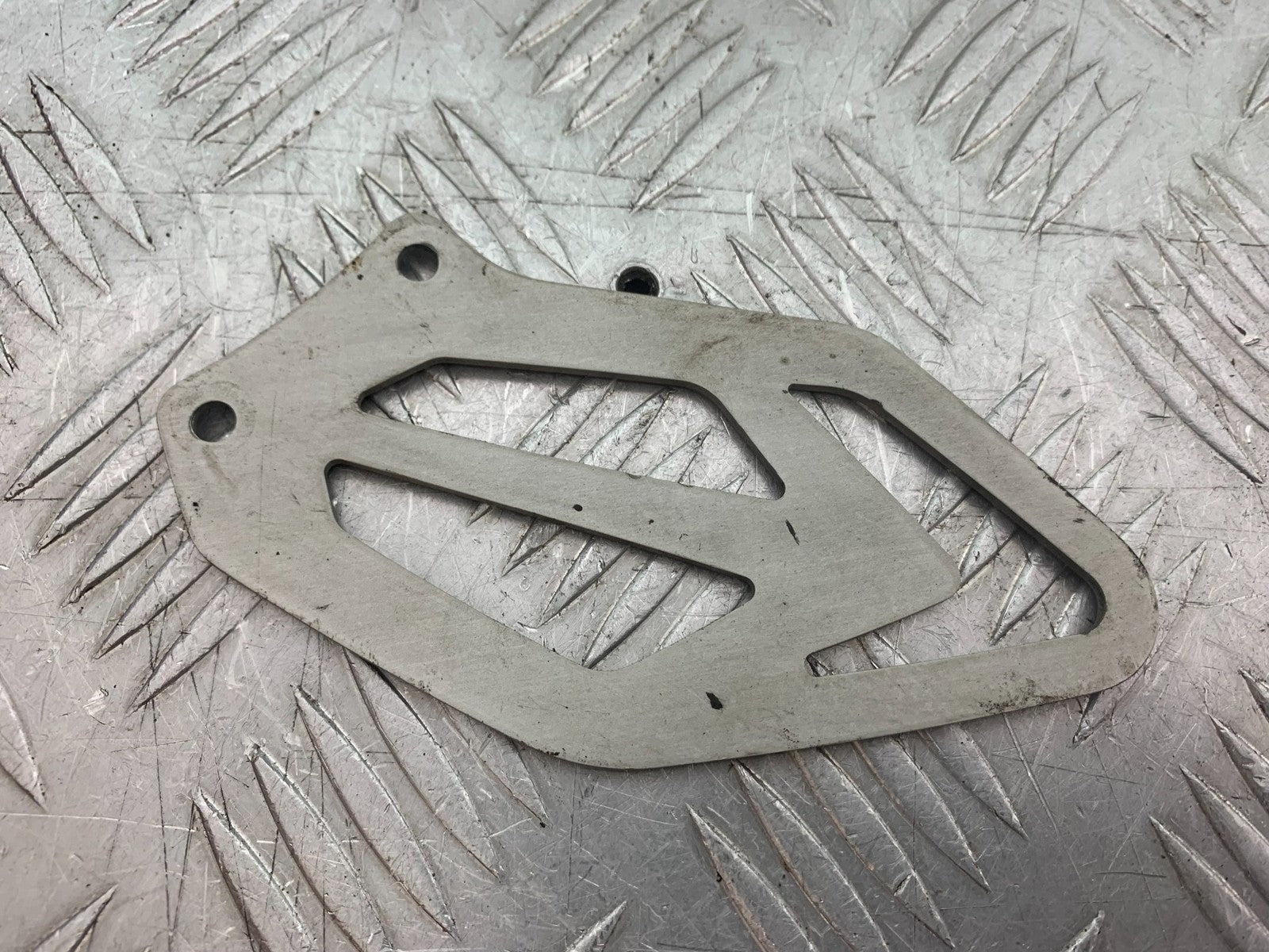 BMW S1000 RR LEFT HEEL PLATE  YEAR 2015-2018 (CMB1246)