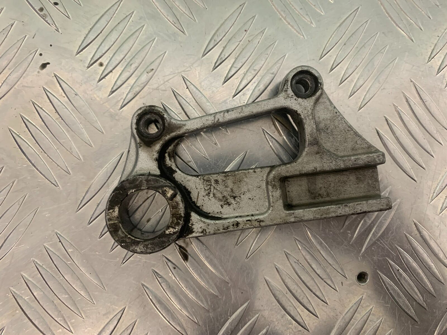 KAWASAKI ZX6R ZX6 J REAR CALIPER BRACKET   YEAR 2000 (STOCK 947)