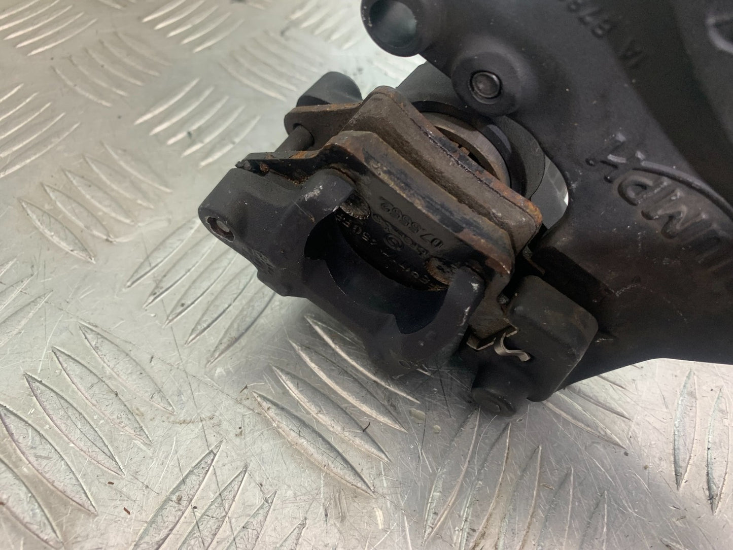 TRIUMPH 675 STREET TRIPLE REAR CALIPER AND BRACKET   2013-2016 (CMB1186)