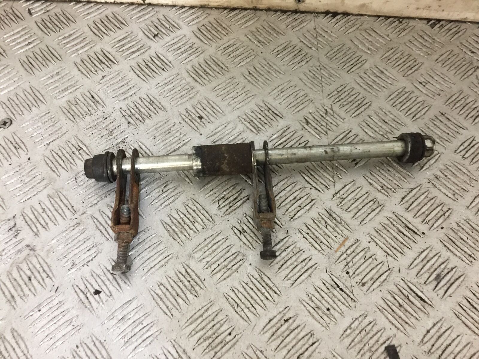 MUTT MONGREL 125 REAR WHEEL SPINDLE  YEAR 2016-2020 (STOCK 738)