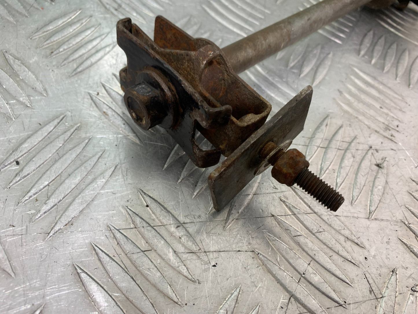 QINGQI QM125 GY-2B REAR WHEEL SPINDLE   YEAR 2016 (CMB1228)