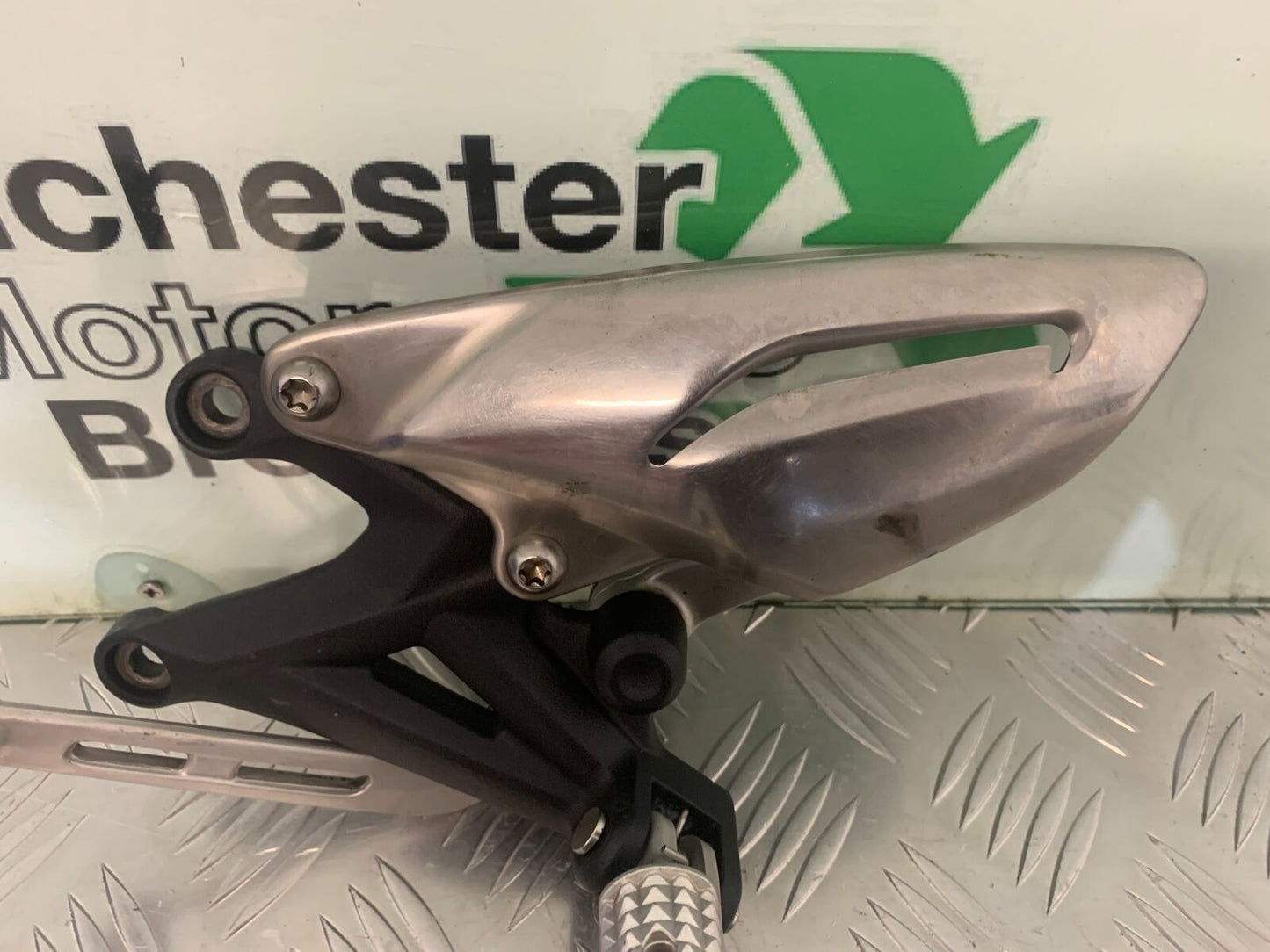 TRIUMPH 675 STREET TRIPLE RX FRONT LEFT HANGER YEAR  2015-17 (STOCK 971)