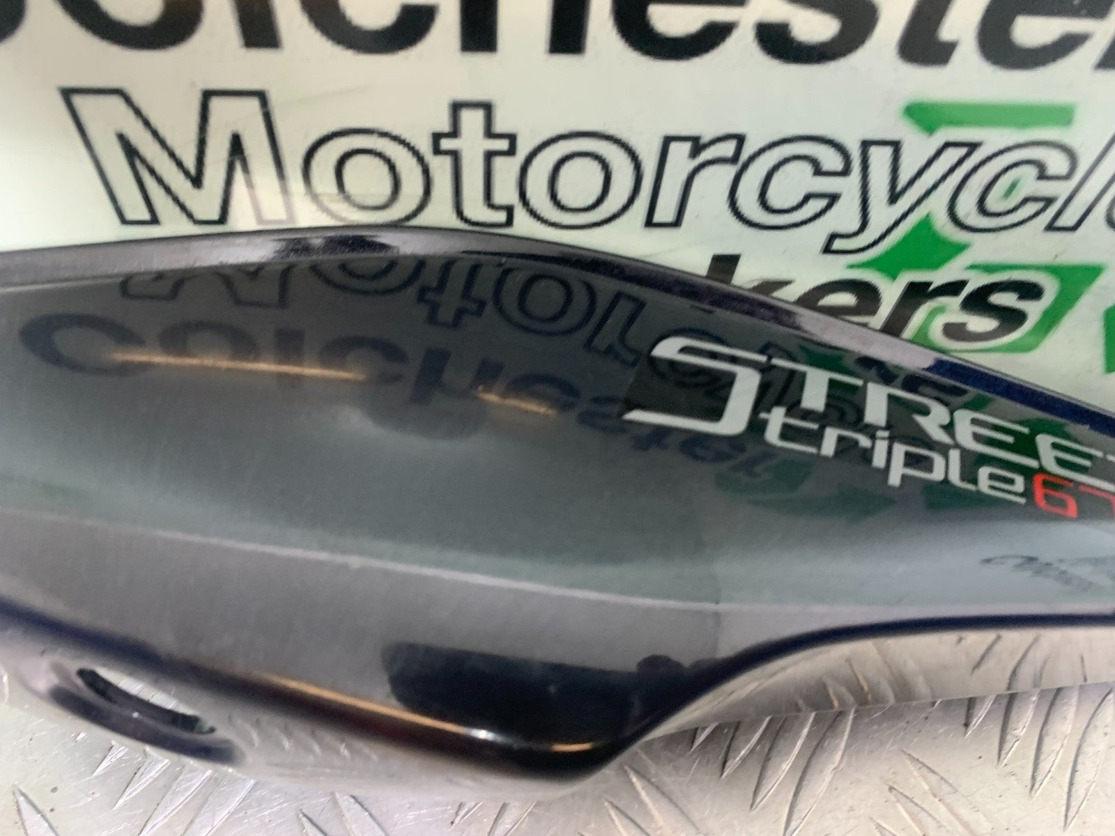 TRIUMPH 675 STREET TRIPLE LEFT SEAT PANEL    2013-2016 (CMB1186)