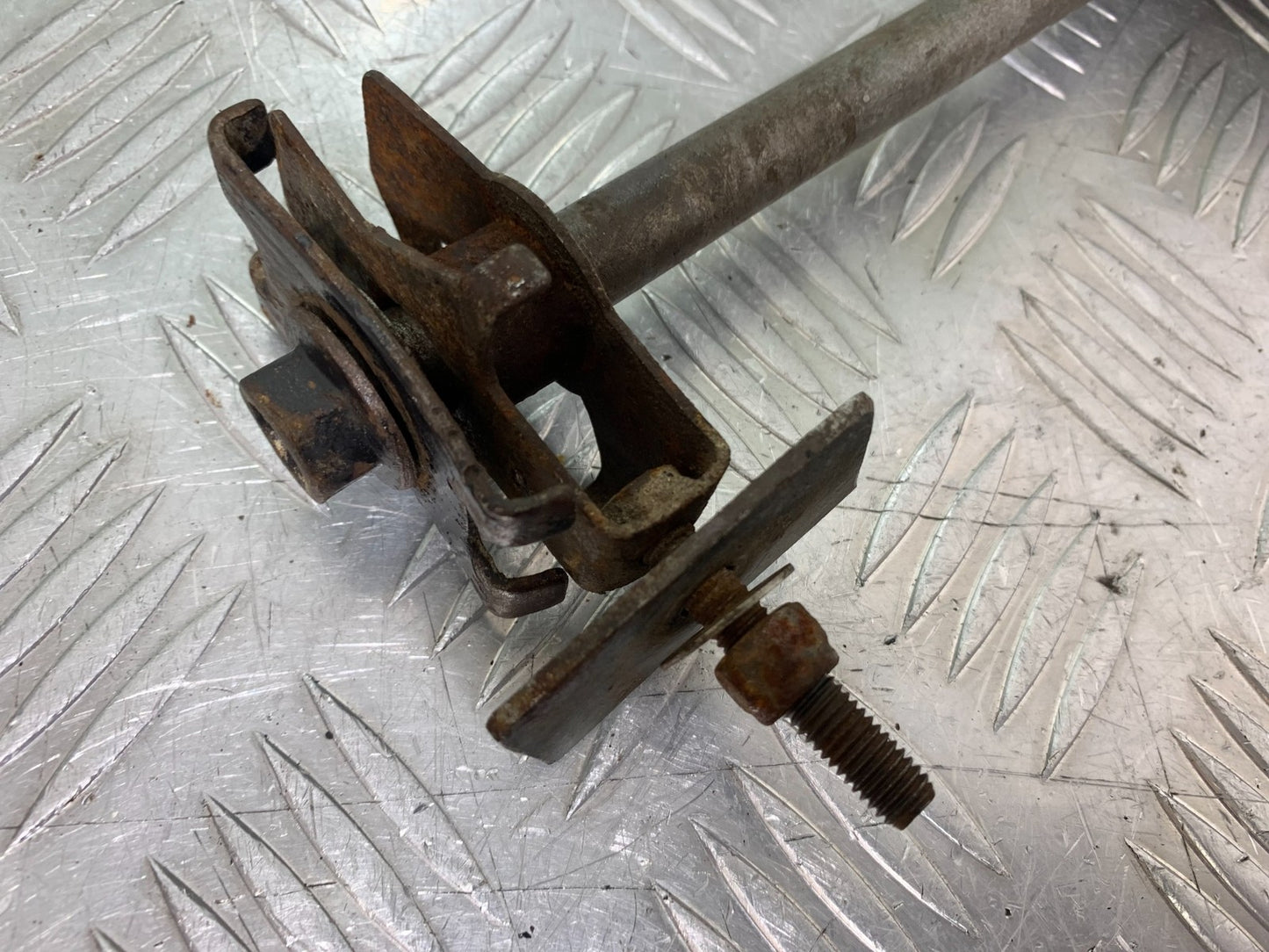 QINGQI QM125 GY-2B REAR WHEEL SPINDLE   YEAR 2016 (CMB1228)
