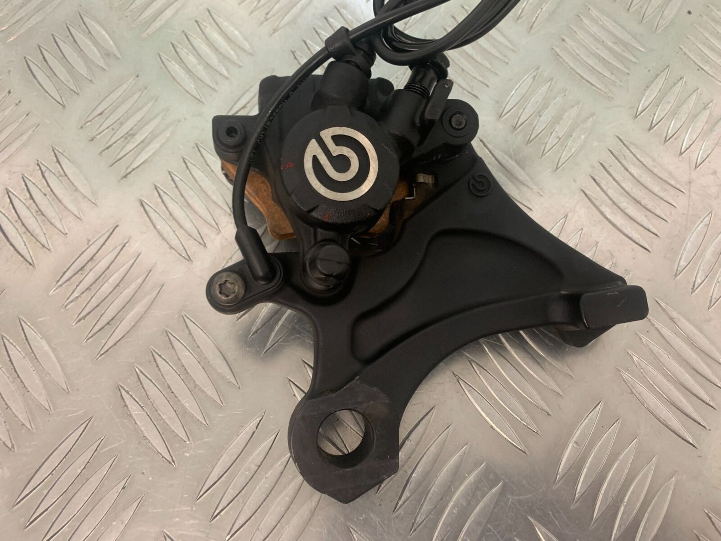 TRIUMPH 675 STREET TRIPLE RX REAR CALIPER  YEAR 2015-2017  (STOCK 971)