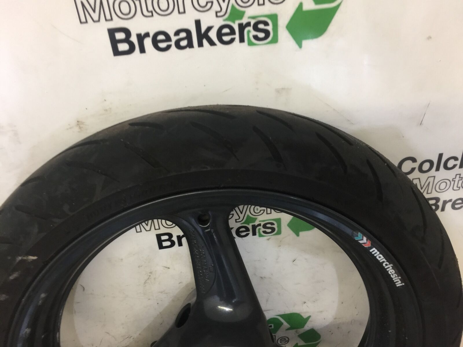 MOTO GUZZI SPORT 4V FRONT WHEEL (GOOD TYRE) YEAR 2009 (STOCK 469)