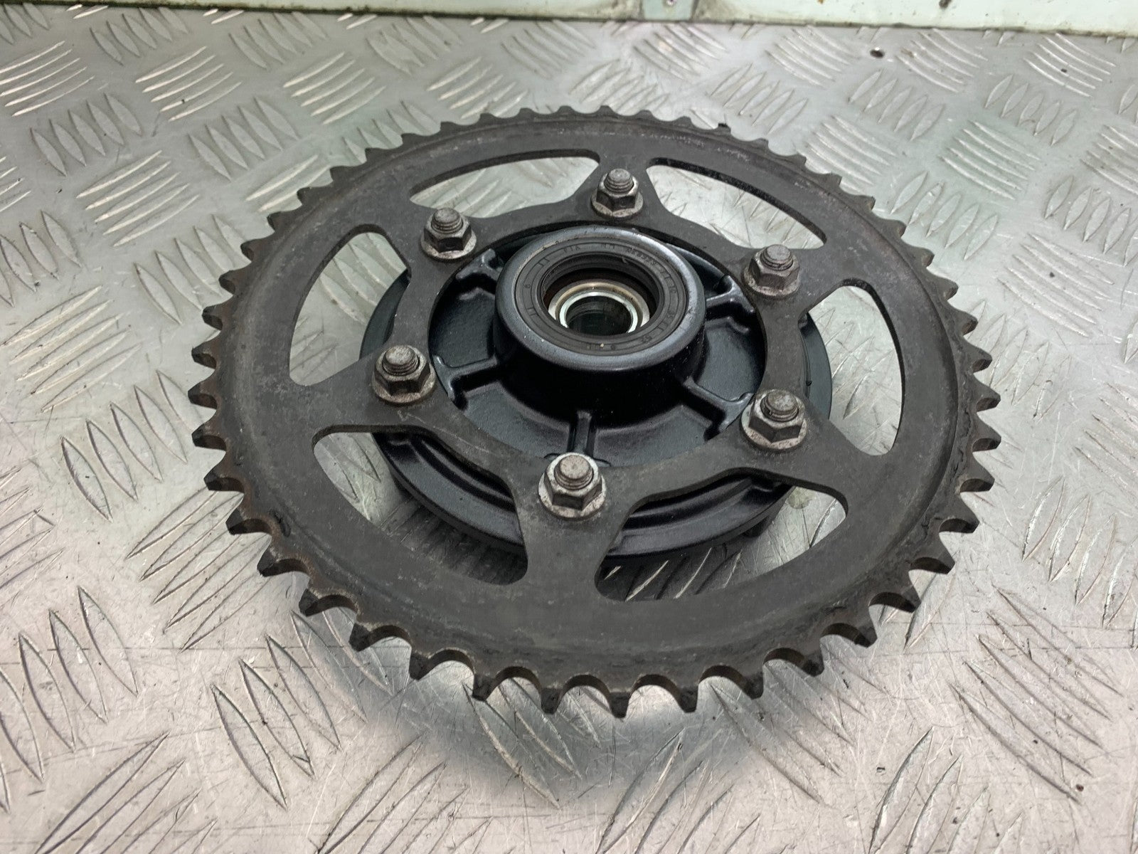 TRIUMPH 675 STREET TRIPLE RX SPROCKET CARRIER  2015- 2017 (CMB1299)